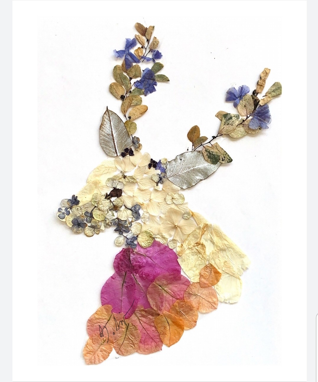 Handmade deer made with flower pressing